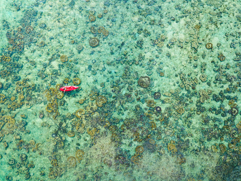 Woman kayaking in the South China sea, Malaysia