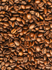 coffee beans (good and bad grain) - arabica and robusta blend (roasted coffee grain). Black background. Top view . Copy space