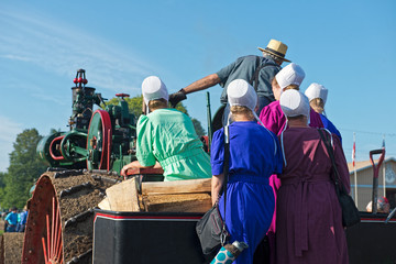 Amish Ladies with Dad on Steam Engine