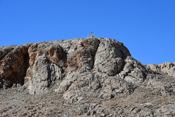 Typical Tibetan place of power and worship, marked with colorful flags with mantras near lake Seling