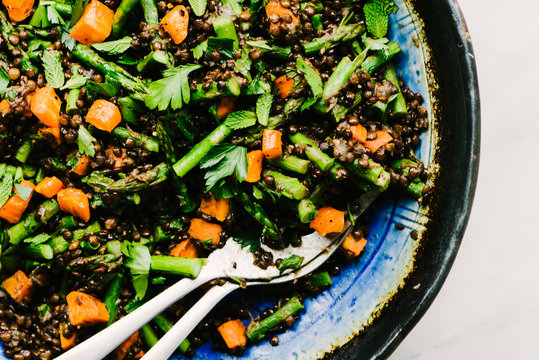 Black Lentils with Roasted Asparagus and Carrots in a platter