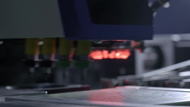Electronic circuit board production. Automated Circut Board machine Produces Printed digital electronic board. Electronics contract manufacturing. Manufacture of electronic chips. High-tech.