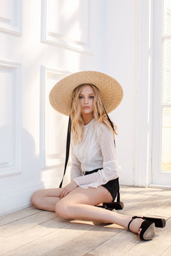 Beautiful woman in straw hat