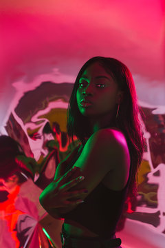 Portrait of a black woman with colored lights