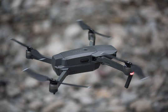 Close-up of a small drone hovering