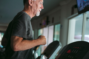 Man exercising on treadmill