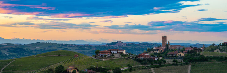 Barbaresco town view on sunset light. Vineyards from Langhe region,Italy agriculture. Unesco world heritage site. Piedmont Italy - obrazy, fototapety, plakaty