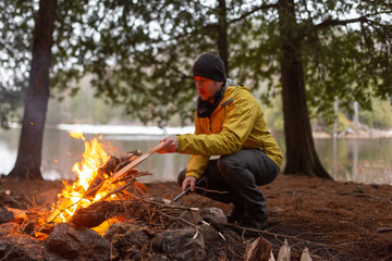 Man Campfire Spring Canoe Trip Backcountry Wilderness Camping