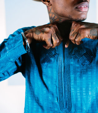 Fashionable black model wearing traditional Nigerian clothing