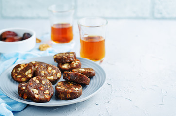 Dates and nuts roll. Indian sweets. Khajoor Katri