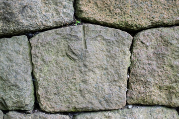 old stone boulder wall granite