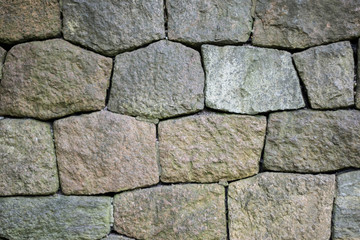 old stone boulder wall granite