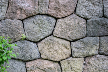 old stone boulder wall granite