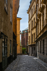 Fototapeta na wymiar The narrow cobbled streets of Stockholm in Spring