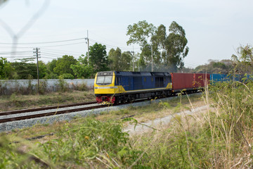 High Speed Electric train. Cargo train platform with freight train container at depot in port use...