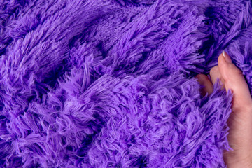 Soft, fluffy, lilac carpet. Space for text