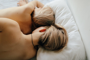 lesbian couple on the bed