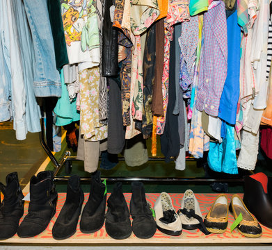 rack of shirts and shoes