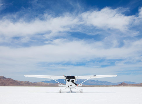 Single engine airplane parked on Bonneville Salt Flats, Utah