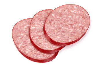 Sliced dry salami sausage, close-up, isolated on white background