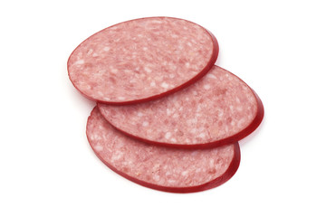 Sliced salami smoked sausage, close-up, isolated on white background