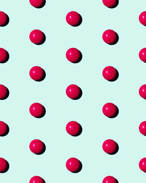 Pink painkillers arranged in row