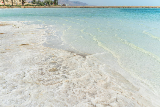 The Dead Sea located in Israel where people to go to swim, float, vacation, and relax in the sun while enjoying its healing properties.