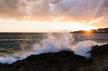 Waves crushing agains the rocky coast in Apulia