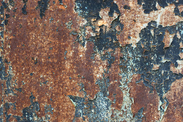 Grunge wall texture, iron rusty gates painted with white-blue-gray paint. Cracked paint on metal, seamless background, blank for text. horizontal frame