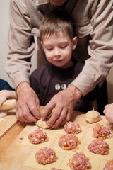 boy sculpts dumplings