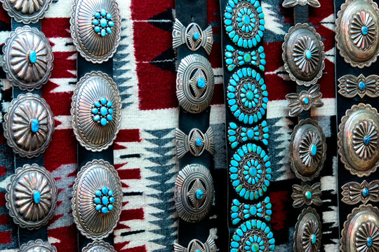 Old pawn Native American concho belts at trading post