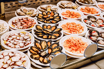 Close-up of plates with seafood