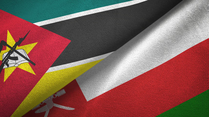 Mozambique and Oman two flags textile cloth, fabric texture