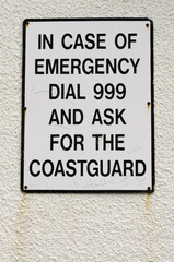 Sign "In case of emergency dial 999 and ask for the coastguard"