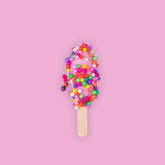 Colorful ice cream on a soft pink background. Squared summer concept image. Abstract