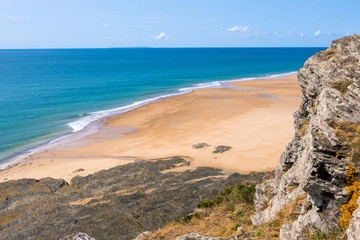 Rocky coast and beach on the Cape Carteret. Normandy, France