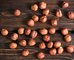 .hazelnuts top on wooden background