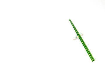 oriental table set up with bamboo sticks on white background top view space for text