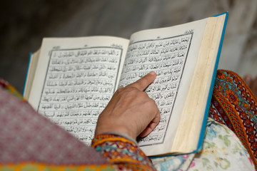 Women Reading Holy Quran