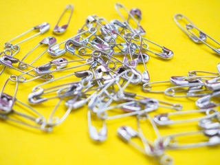 Lots of safety pins. Team concept