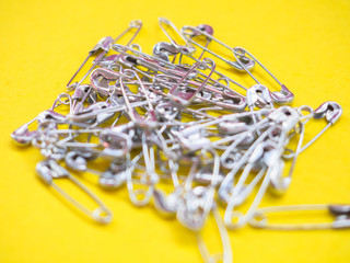 Lots of safety pins. Team concept