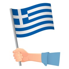 Obraz premium Greece flag in hand