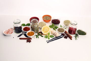 Spices and herbs on table. Food and cuisine ingredients with basil