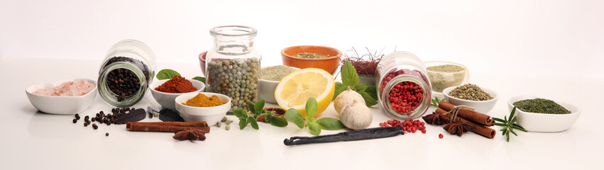 Spices and herbs on table. Food and cuisine ingredients with basil © beats_