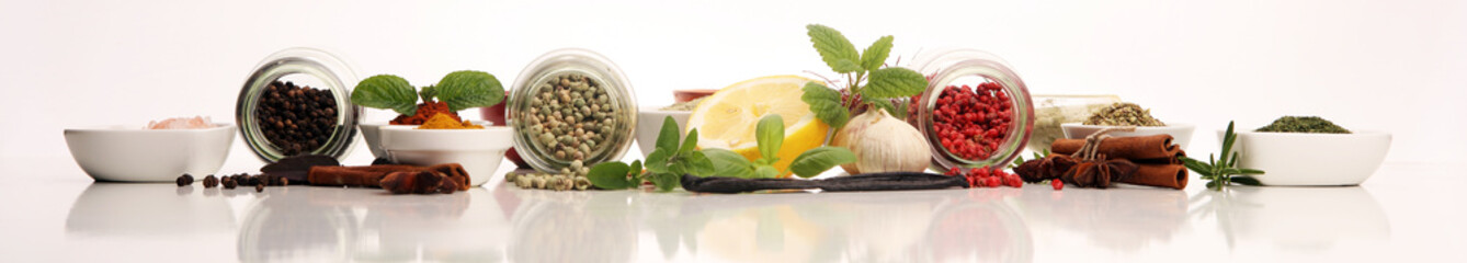 Spices and herbs on table. Food and cuisine ingredients with basil © beats_