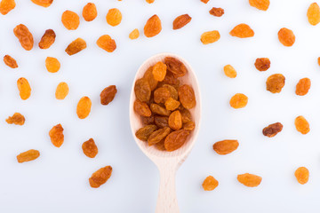 raisins on a white background. dried grapes. raisins close up