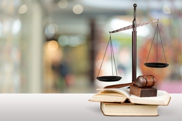 Justice Scales and books and wooden gavel