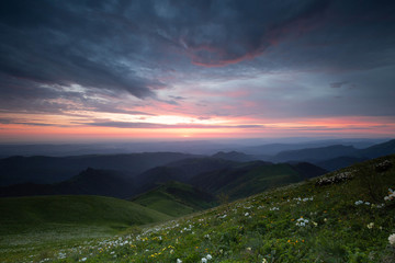 Russia. The formation and movement of clouds over the summer slopes of Adygea Bolshoy Thach and the Caucasus Mountains