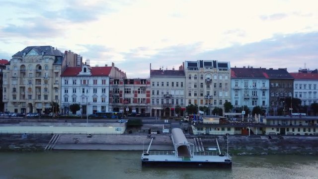 Aerial footage of Budapest, Hungary over the Danube river on a summer's day.