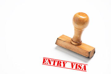 Rubber stamp with entry visa sign on white background.